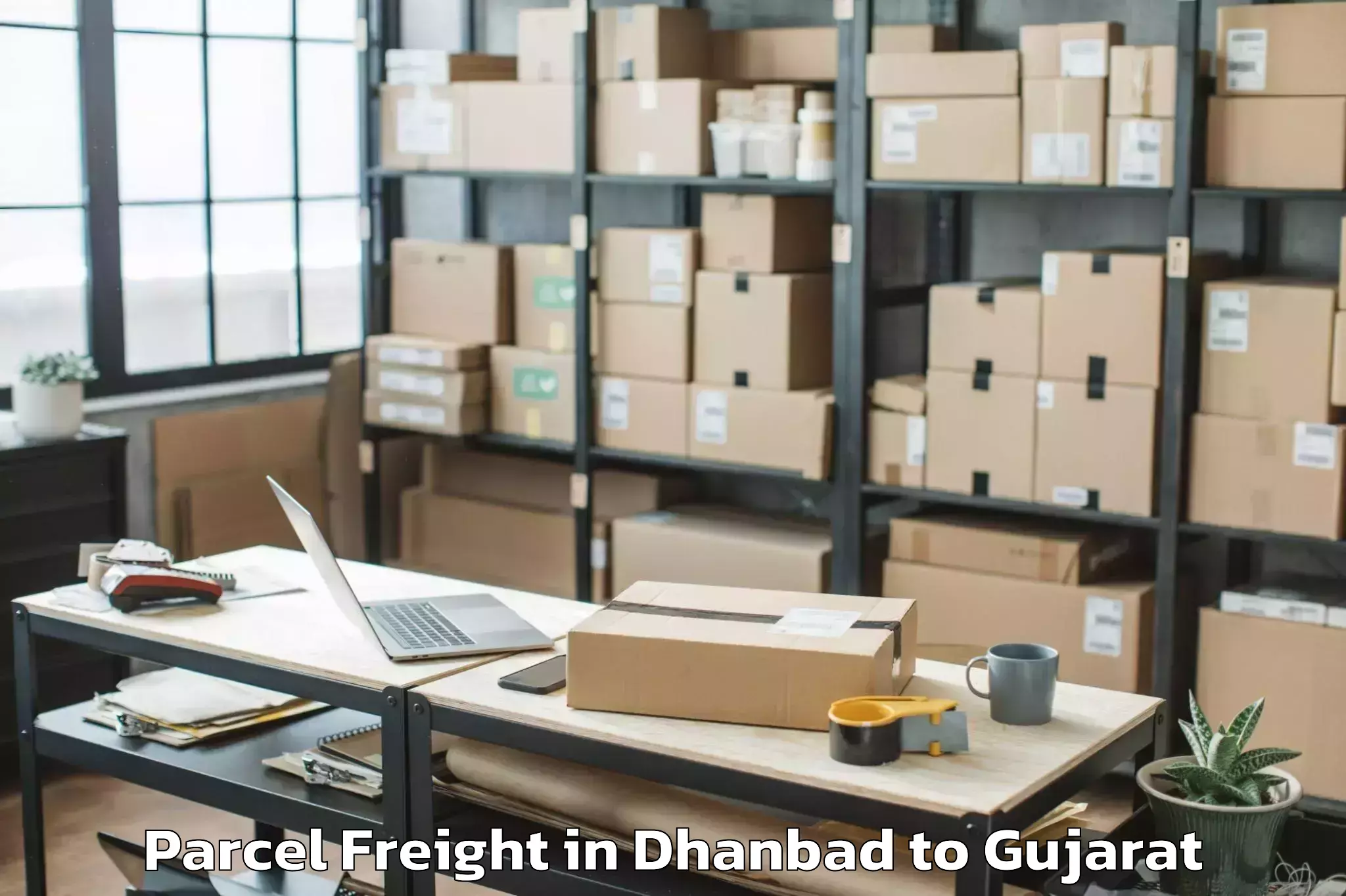 Trusted Dhanbad to Iiit Surat Parcel Freight